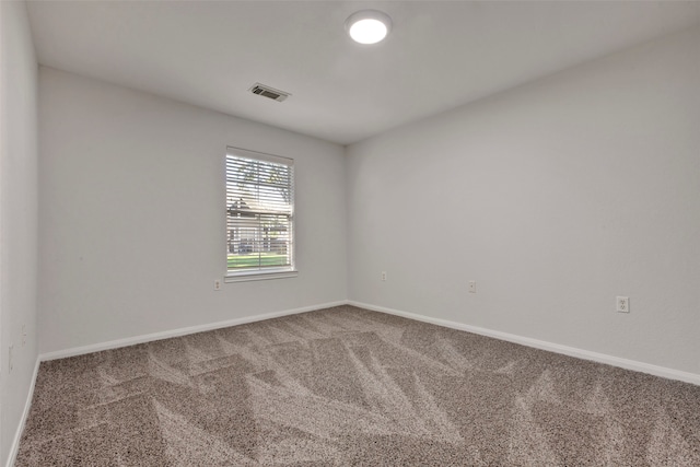 empty room with carpet floors