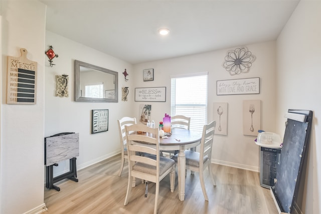 dining space featuring light hardwood / wood-style flooring