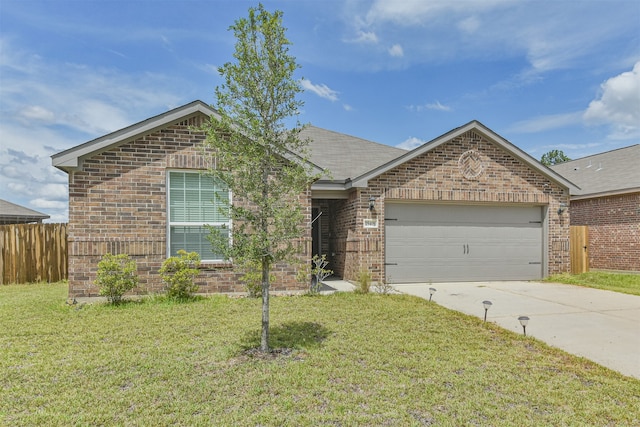 ranch-style home featuring a garage and a front lawn