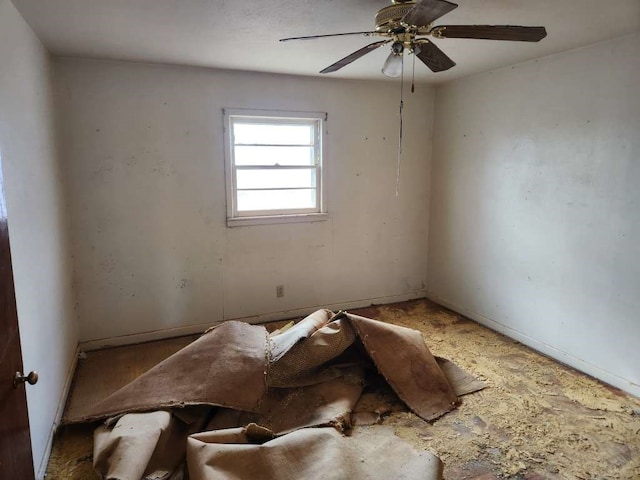 spare room with ceiling fan