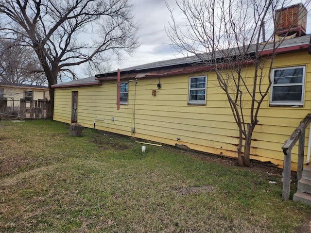 view of property exterior featuring a yard