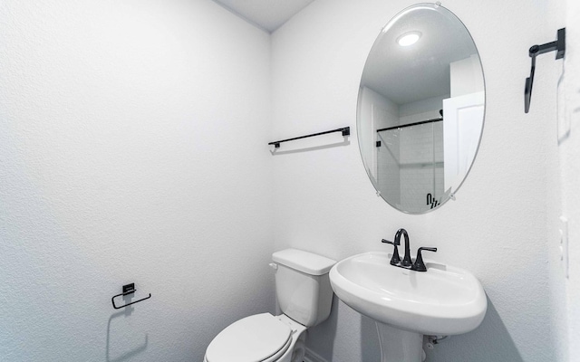 bathroom with sink and toilet