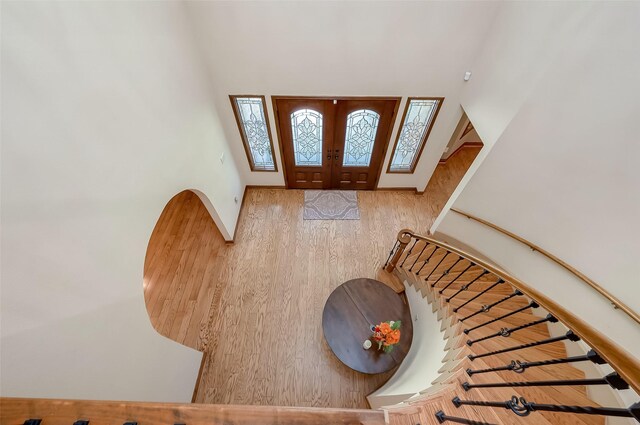 foyer featuring french doors and hardwood / wood-style flooring