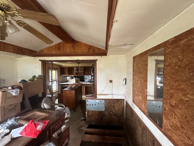 miscellaneous room with ceiling fan and lofted ceiling with beams