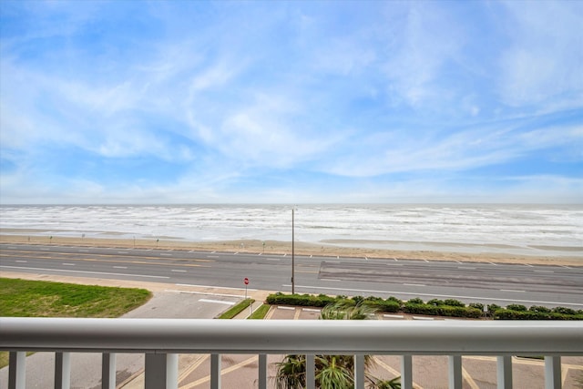 view of water feature with a beach view