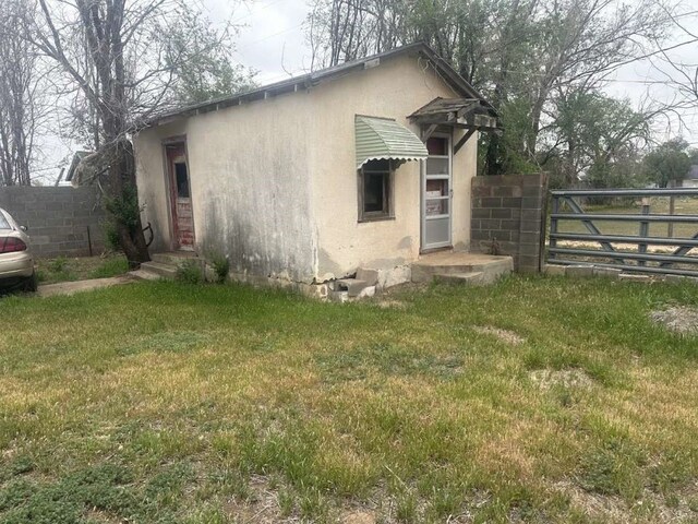 exterior space featuring a yard