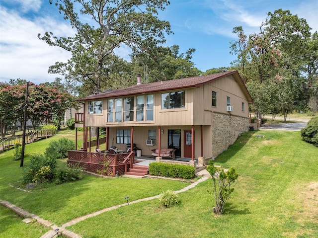 view of front of home featuring a front lawn and brick siding