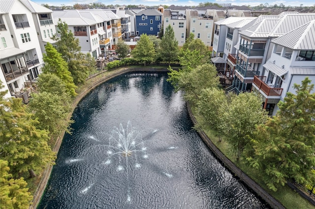 drone / aerial view with a water view