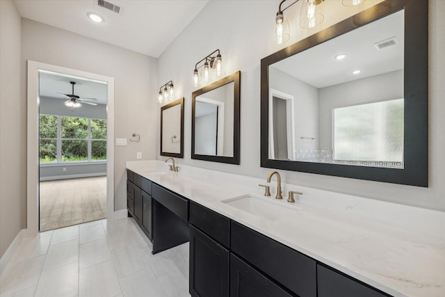 bathroom featuring vanity and tile patterned flooring