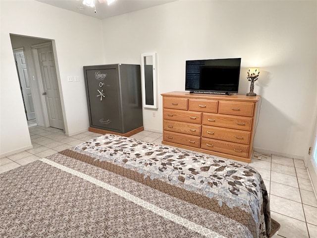 bedroom with light tile patterned floors