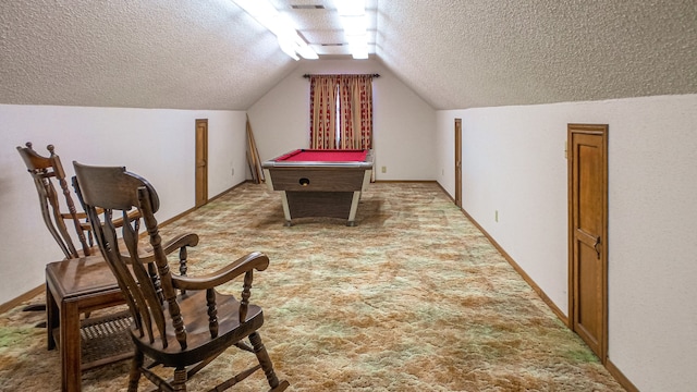 recreation room featuring light carpet, a textured ceiling, billiards, and vaulted ceiling