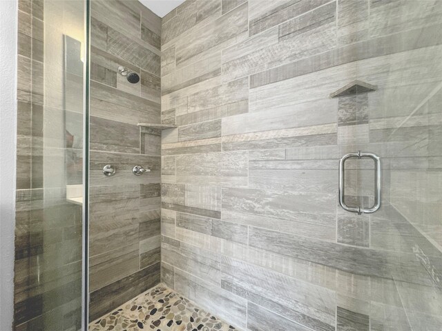 bathroom featuring an enclosed shower