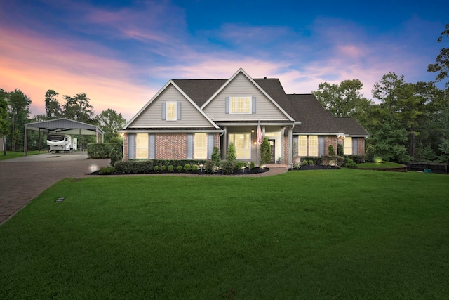 craftsman-style home with a carport and a yard