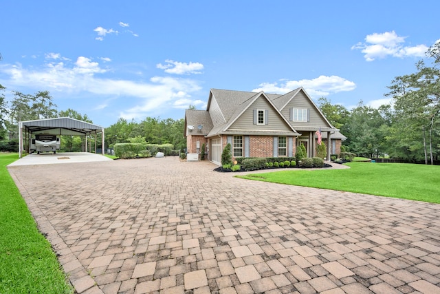 view of front facade with a carport and a front yard