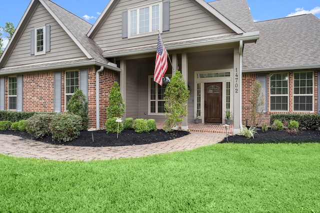 view of front of house with a front lawn