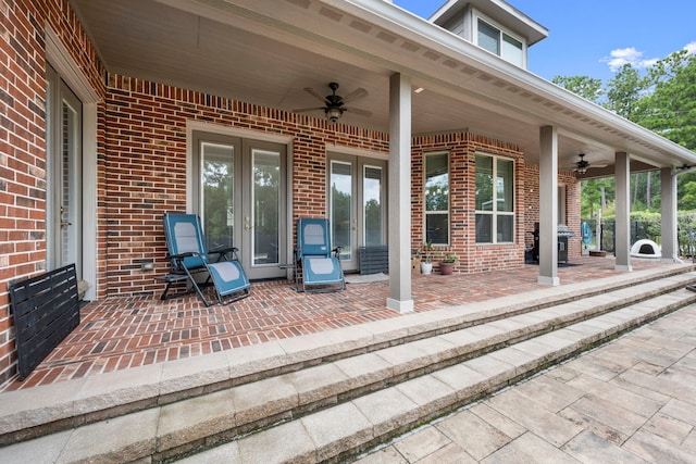 view of patio featuring ceiling fan