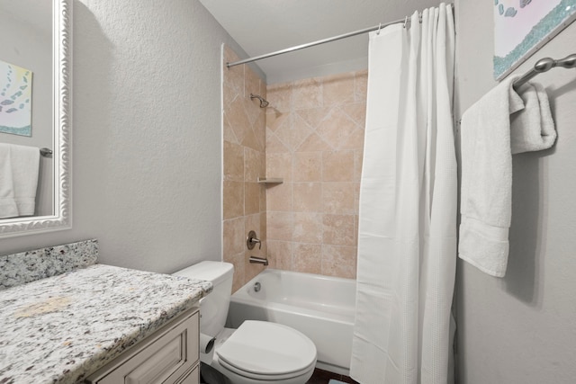 full bathroom featuring vanity, toilet, and shower / tub combo