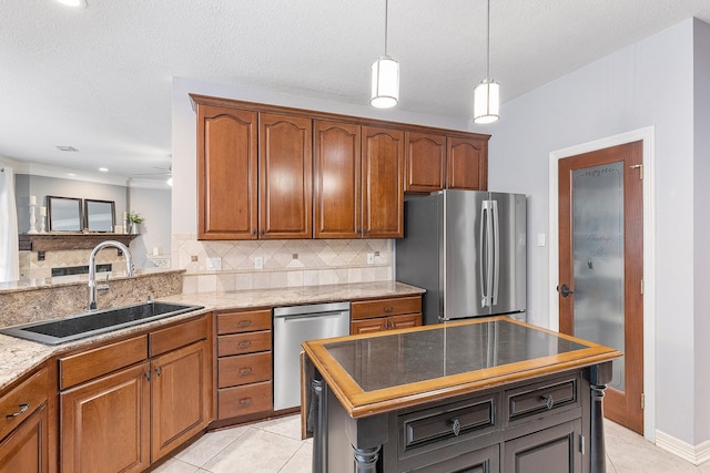 kitchen featuring light tile patterned flooring, sink, a center island, stainless steel appliances, and backsplash