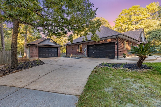 ranch-style home with a garage