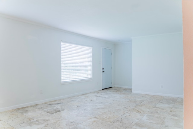 spare room with ornamental molding