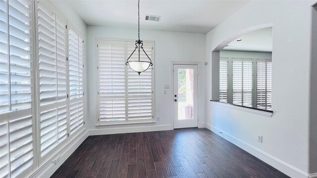 entrance foyer featuring dark wood-type flooring