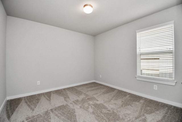 19722 Vino Vale Dr, Hockley, TX 77447 - empty room with carpet, healthy amount of natural light, and baseboards