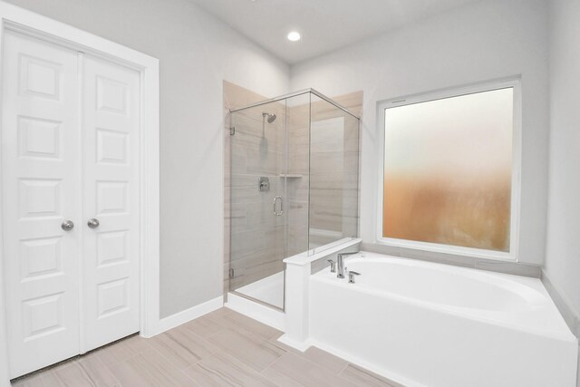 bathroom with independent shower and bath