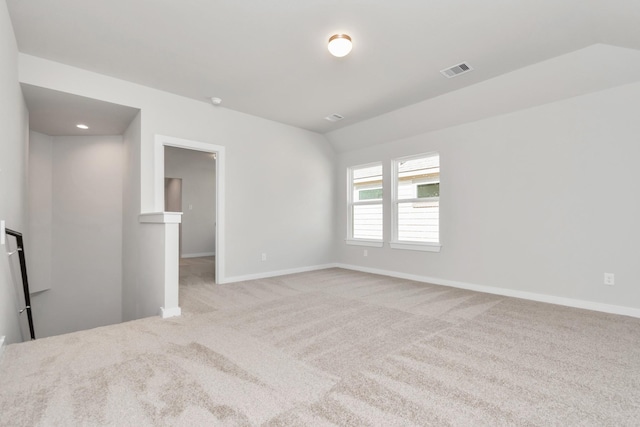 8447 Northern Pintail Dr, Houston, TX 77049 - carpeted empty room with baseboards and vaulted ceiling