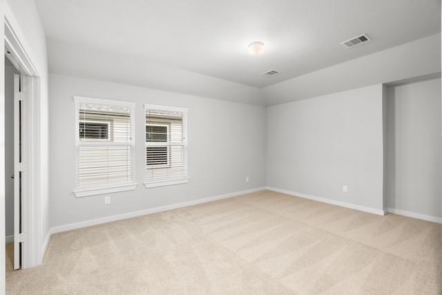 view of carpeted spare room