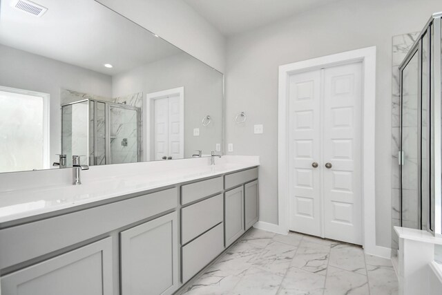 bathroom featuring vanity and separate shower and tub