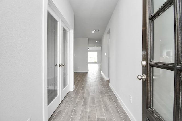 hall featuring light wood-type flooring