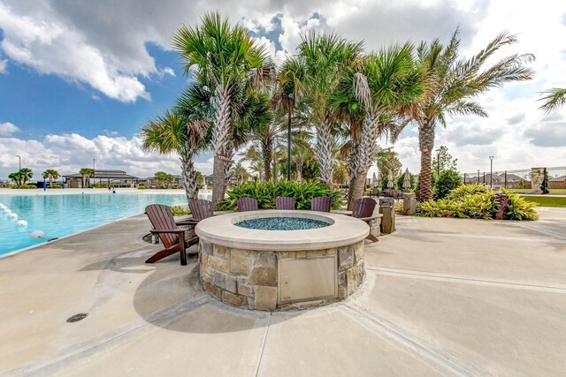 exterior space featuring a patio area and a pool