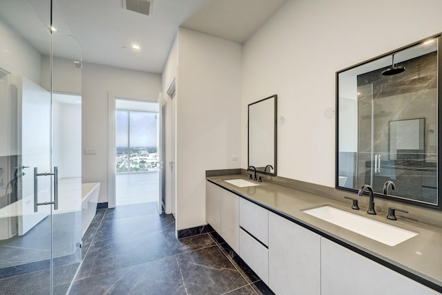 bathroom featuring plus walk in shower and vanity