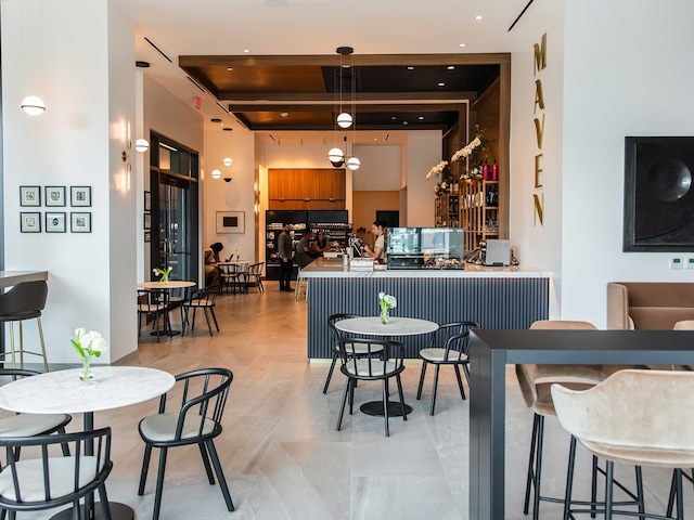 bar featuring decorative light fixtures