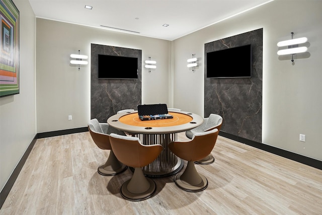 recreation room featuring light hardwood / wood-style flooring