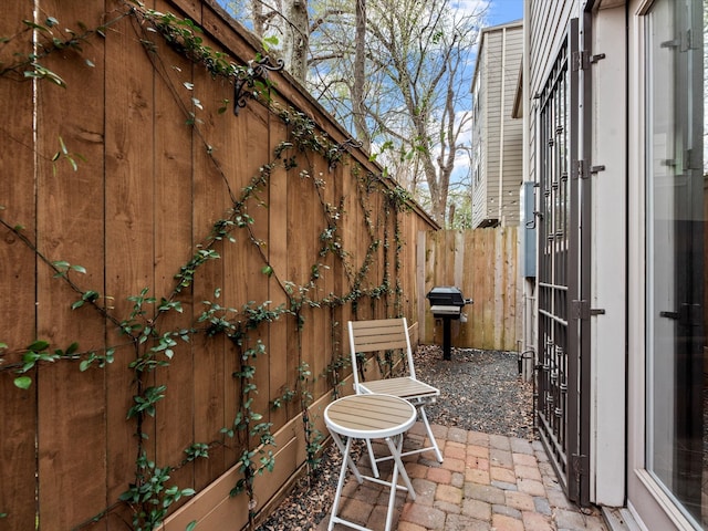 view of patio / terrace featuring a grill