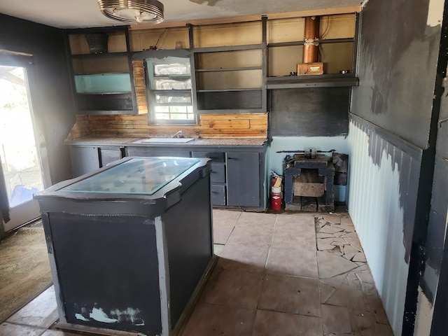 kitchen featuring a center island and plenty of natural light