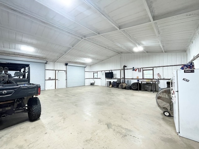 garage featuring white refrigerator