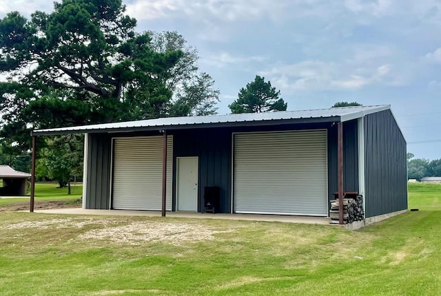 garage with a lawn