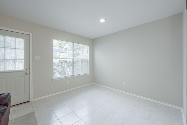 interior space featuring light tile patterned flooring