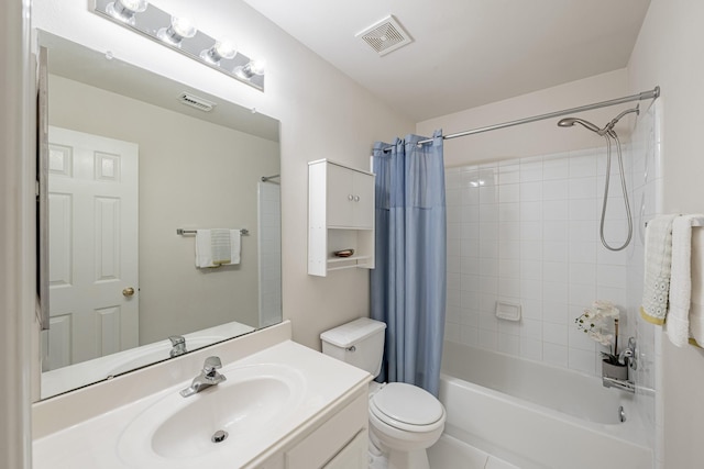 full bathroom featuring vanity, shower / tub combo, and toilet