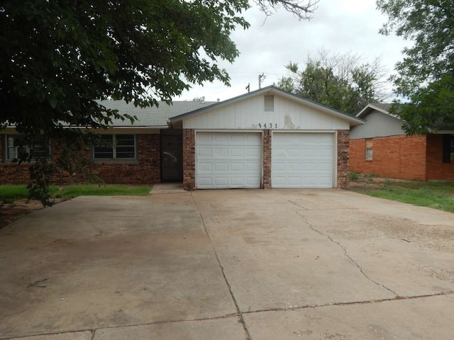 ranch-style home featuring a garage