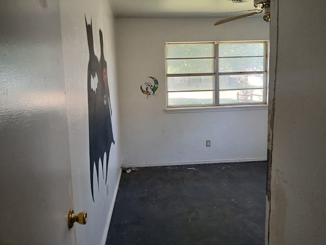 unfurnished room featuring ceiling fan