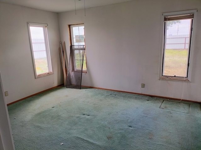 view of carpeted spare room