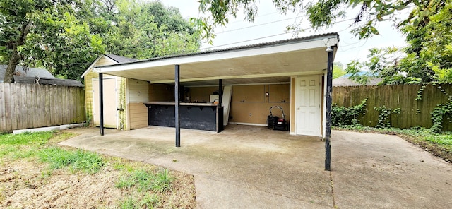 exterior space with a carport