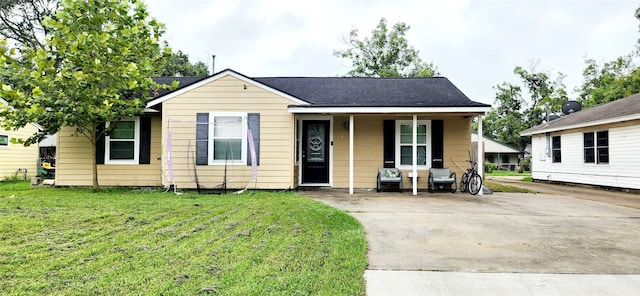 bungalow-style house with a front yard