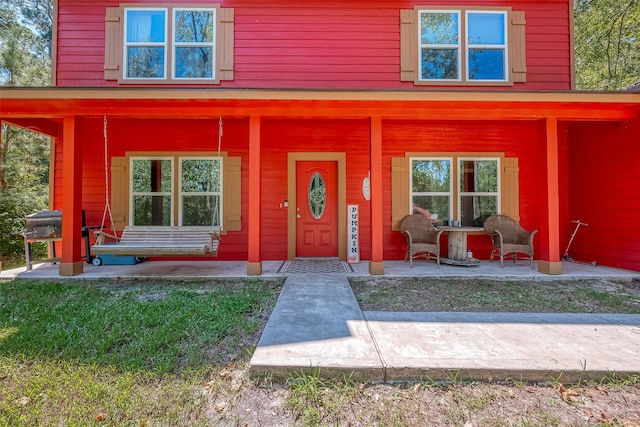 exterior space featuring covered porch