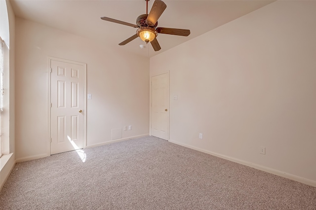 unfurnished room featuring carpet and ceiling fan