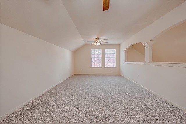 bonus room with lofted ceiling, ceiling fan, and carpet floors