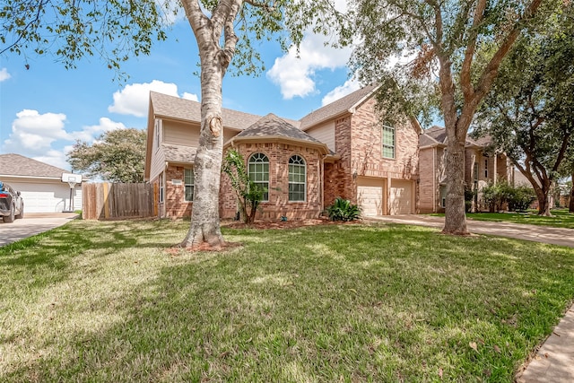 view of front facade featuring a front yard and a garage